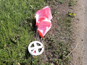 red parachute next to A31 road